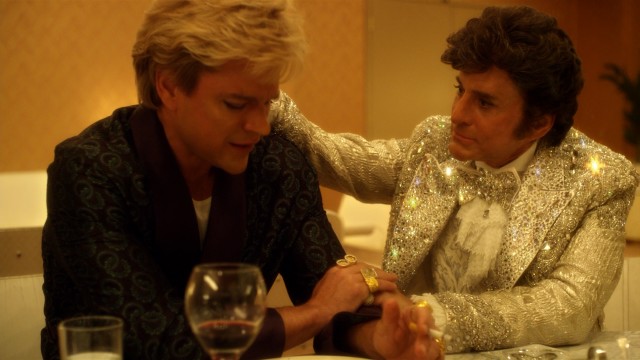 Liberace (Michael Douglas) places a supportive arm on the shoulder of his young, surgically enhanced lover (Matt Damon) in "Behind the Candelabra."