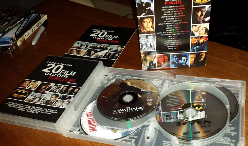 The packaging of "Best of Warner Bros. 20 Film Collection: Thrillers" consists of two thick clear keepcases holding the twenty discs of the twenty films in chronological order plus a booklet in a glossy cardboard box.