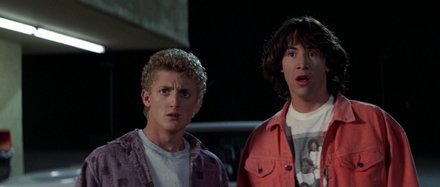 "Bill & Ted's Excellent Adventure" stars Alex Winter and Keanu Reeves as dim-witted teenagers picked to travel through time in preparation for their History oral report.