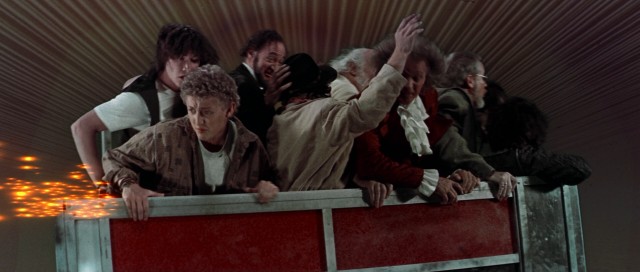 Bill and Ted journey through time in a telephone booth full of historic figures, including Abraham Lincoln, Socrates, Beethoven, and Sigmund Freud.