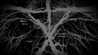 The black and gray main menu animates the branches from the poster/cover art.