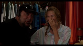 Director Frank Coraci appears alongside a giggling Drew Barrymore in the Blended gag reel.