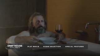 Borgman (Jan Bivjoet) enjoys a bath, a meal, and some television on the Blu-ray's top menu.