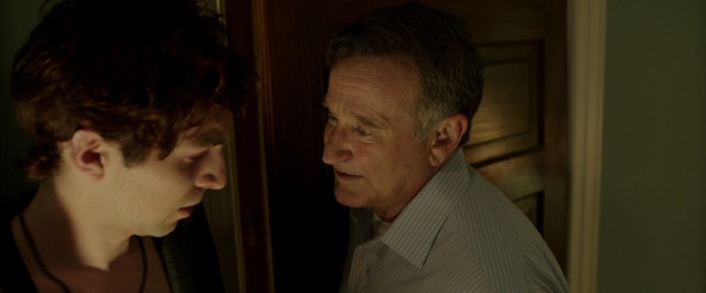 Nolan (Robin Williams) develops strong feelings for a young male prostitute named Leo (Roberto Aguire).