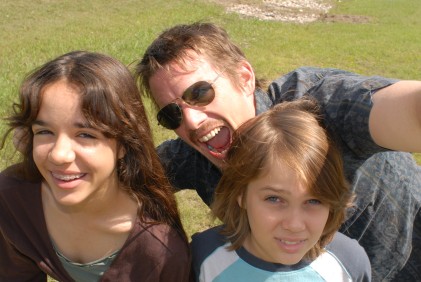 Mason Sr. (Ethan Hawke) clowns around with his kids, Samantha (Lorelei Linklater) and 9-year-old Mason Jr. (Ellar Coltrane) in "Boyhood."