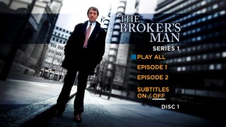 Shot from a low angle, Kevin Whately stands tall on The Broker's Man: Series 1 DVD main menu.