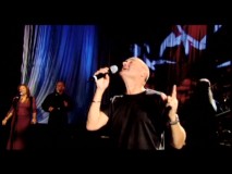 Phil Collins gets really into it in his "Look Through My Eyes" music video.