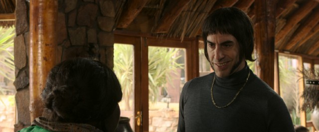 Nobby (Sacha Baron Cohen) attempts a Sean Connery accent as he assumes the spy duties of his incapacitated MI6 agent brother.