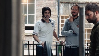 Sacha Baron Cohen and director Louis Leterrier enjoy a moment on the set of "The Brothers Grimsby" in the Blu-ray's making-of featurette.