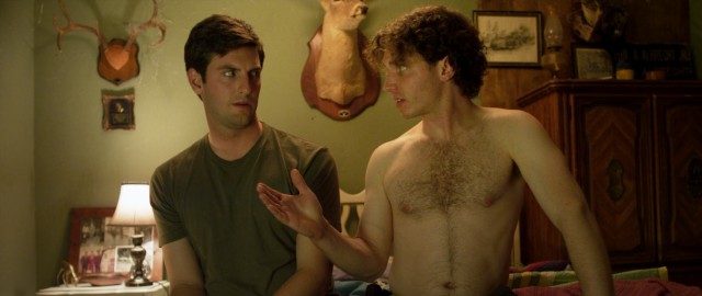 Shirtless New Yorker cousin Jerry (Jarrod Pistilli) gives Craig (Matthew Albrecht) some unsolicited advice on matters of the heart in "Buck Wild."