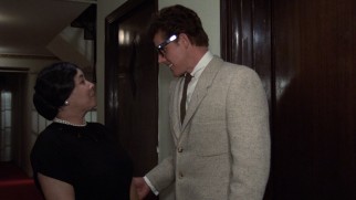 Buddy Holly (Gary Busey) makes a smart move by asking Mrs. Santiago (Gloria Irizarry) permission to date her niece.