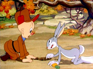 In his first official appearance, "A Wild Hare", Bugs Bunny helps Elmer Fudd during wabbit season.