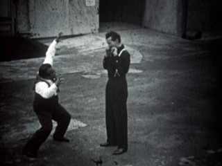 Termite Terrace animators act out scenes they will animate in documentary footage from "Bugs Bunny Superstar."