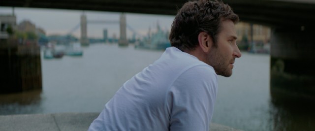 Adam Jones (Bradley Cooper) thinks about his life by the River Thames.