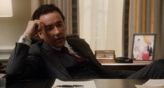 A slight prosthetic nose isn't nearly enough to make John Cusack look like President Richard Nixon.