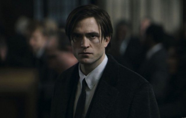 Robert Pattinson sports an unflattering hairstyle as the latest actor to portray Bruce Wayne, in "The Batman" (2022).