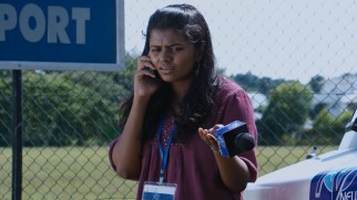 Television reporter Dilky Thenuwara (Numaya Siriwardena) has mixed reactions about the role the bomber asks her to play.