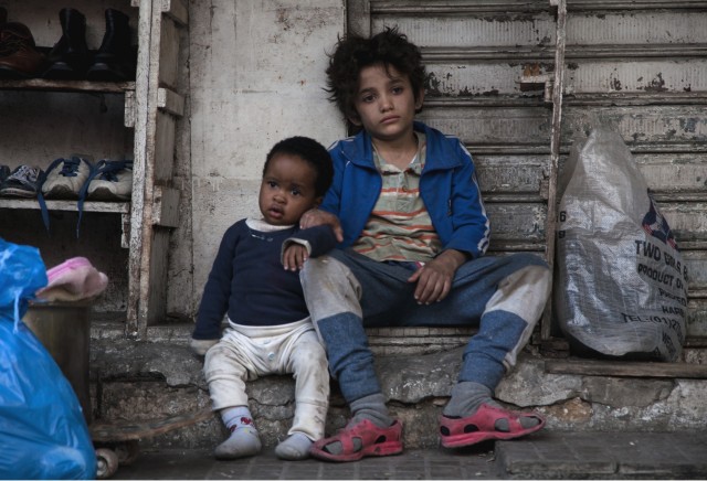 In "Capernaum", a Lebanese runaway (Zain Al Rafeea) takes care of the secret baby (Treasure Bankole) of an Ethopian refugee.