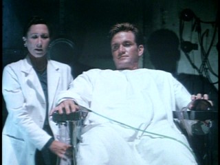 Dr. Vaselli (Carla Cassola) prepares a not so weak Steve Rogers (Matt Salinger) for his transformation.