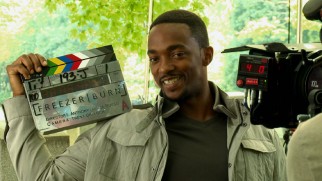 Cut the check! Anthony Mackie proudly holds the slate bearing Captain America: The Winter Soldier's fake working title of "Freezer Burn."