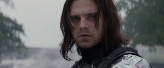 Unmasked, The Winter Soldier (Sebastian Stan) wields a familiar face.