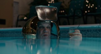 Dean "Deanzie" Ziegler (John C. Reilly) proclaims himself Captain Nemo as he wears a garbage can cover as a helmet in a rule-breaking late night pool dip in "Cedar Rapids."