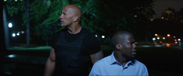 Bob (Dwayne Johnson) and Calvin (Kevin Hart) await the exchange of security codes for money in one of the climaxes of #109, "Central Intelligence."