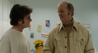 Business manager Saul (Bill Murray) voices his own problems to a hospitalized Charles Swan III (Charlie Sheen).
