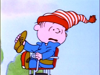 Linus and Lucy's younger brother Rerun shares thoughts from the back of his mother's bicycle.