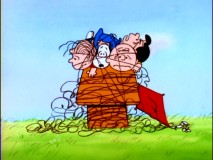 Good grief! Everyone gets tangled up in Charlie Brown's kite.