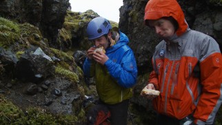 Field assistants Adam LeWinter and Svavar Jonatansson take a moment to enjoy tasty sandwiches.