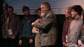 Glaciologist Tad Pfeffer and his great big bushy beard answer an audience member's question at a "Chasing Ice" screening.