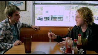 Actors not in the movie try out the old fork vs. hand bit in this camera test.
