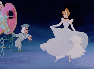 A magically made-over Cinderella prepares to board her pumpkin-spawned horse-drawn carriage to the ball.