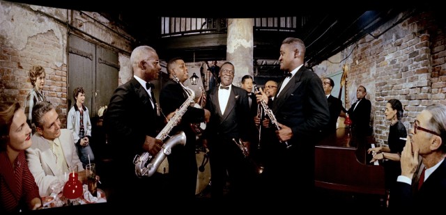 Oscar "Papa" Celestin and a New Orleans jazz band entertain patrons of New Orleans' Absinthe House with "Tiger Rag."