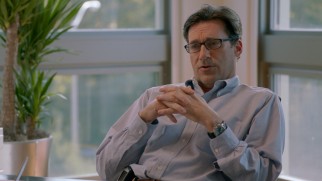 Jon Hamm wears glasses while playing the executive Will Haney, rather than the ad man Don Draper.