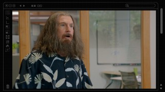 This menu shot shows the shaggy-haired, long-bearded Nathan Flomm (Larry David) is an easy look to distance from.