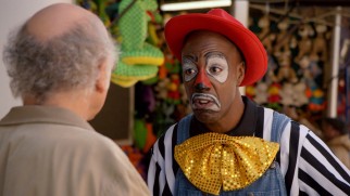 "Curb Your Enthusiasm"'s J.B. Smoove plays Jaspar, who recognizes Rolly's past identity while dressed like this.