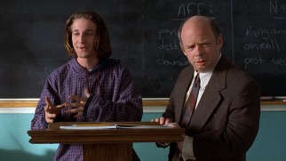 To the bewilderment of Mr. Hall (Wallace Shawn), Travis Birkenstock (Breckin Meyer) gives an impassioned acceptance speech for having the most tardies in his class.