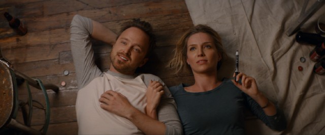 Happier times: David (Aaron Paul) and "Claire" (Annabelle Wallis) admire her marker handiwork on the ceiling of their new place.