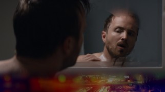 Aaron Paul treats a torture wound on the "Come and Find Me" Blu-ray menu.