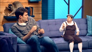 Little orphan Fourvel (Bobby Moynihan) gives Bill Hader a big scare with a knife.