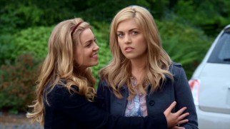 Patching up their five-year estrangement, Melanie (Britt McKillip) gladly turns Kate's (Carly McKillip) attention to some mistletoe.