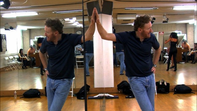 Conan O'Brien catches his breath while auditioning backup singers/dancers in "Conan O'Brien Can't Stop."