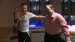 Conan O'Brien and Andy Richter pose for what they hope is a frozen shot for the end credits in this deleted scene.