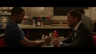 Dr. Bennet Omalu (Will Smith) befriends a football player in a deleted subplot.