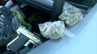 A Stockton, California car search turns up guns and drugs.