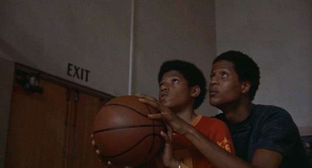 Nathaniel "Cornbread" Hamilton (Jamaal Wilkes) helps his supposed cousin/certain admirer Wilford Robinson (Laurence Fishburne) with his jump shot in "Cornbread, Earl and Me."