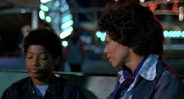 Wilford's mother (Rosalind Cash) struggles to cheer up the boy (Laurence Fishburne) after his hero is killed.