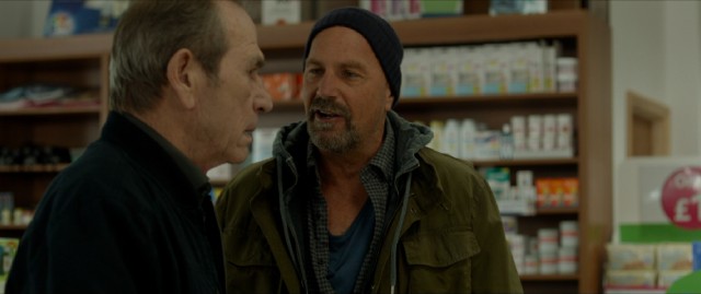 At a pharmacy, Jericho Stewart (Kevin Costner) confronts the doctor who literally messed with his brain (Tommy Lee Jones).